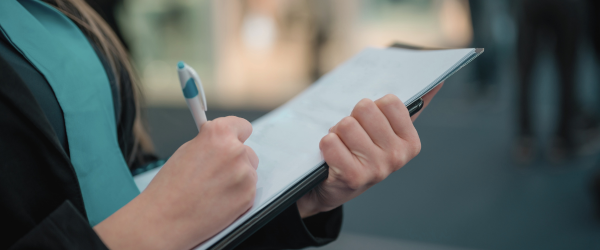meeting checklist on a clipboard